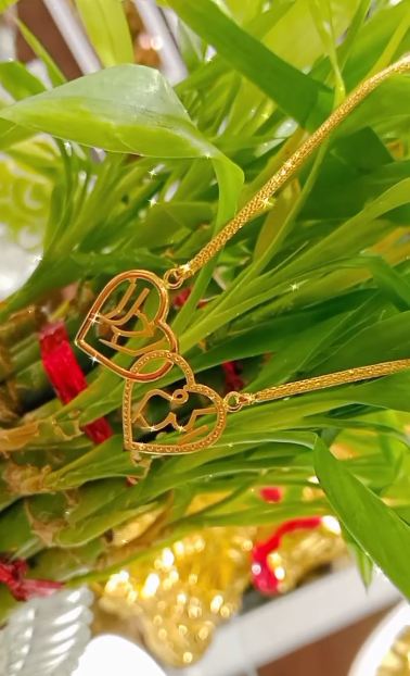 Elegant Interlocking Gold Pendant